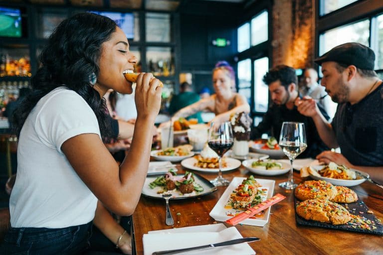 Friends enjoying a meal out together.